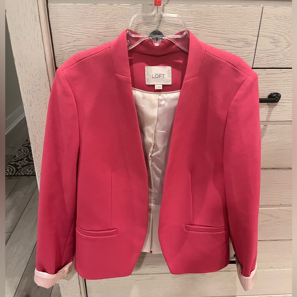Hot pink jacket.